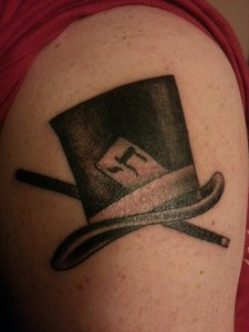 Jesse's tattoo.  A magician's top hat and wand, with the 'chi' symbol...to life